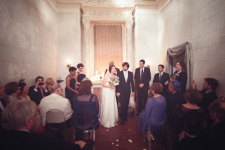 PHOTO: Wedding ceremony in small Tuscan chapel.